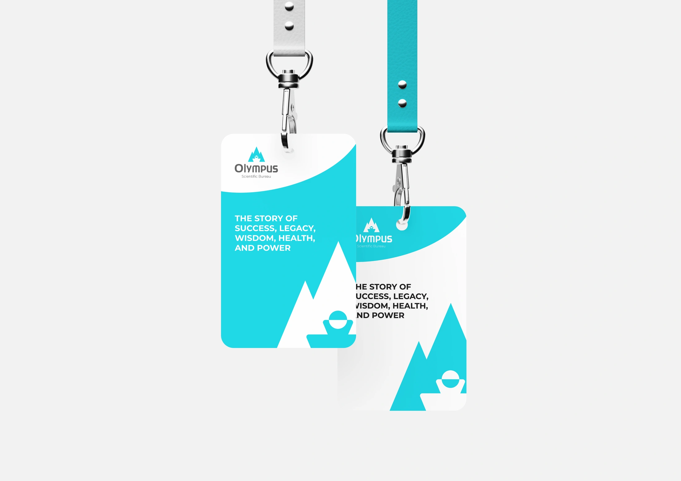 Two Olympus identity badges with turquoise and white lanyards and enlarged mountain graphics