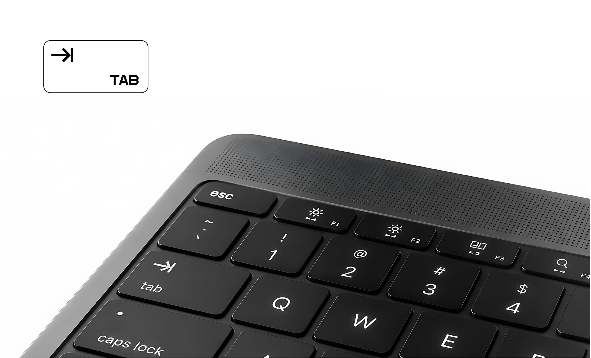 The TAB key and its arrow-and-boundary symbol on a black laptop keyboard